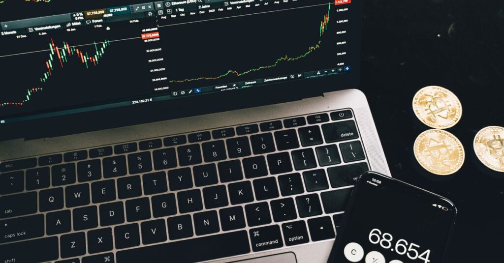 Laptop running MetaTrader while installing a custom Chandelier Exit indicator for MT4 and MT5