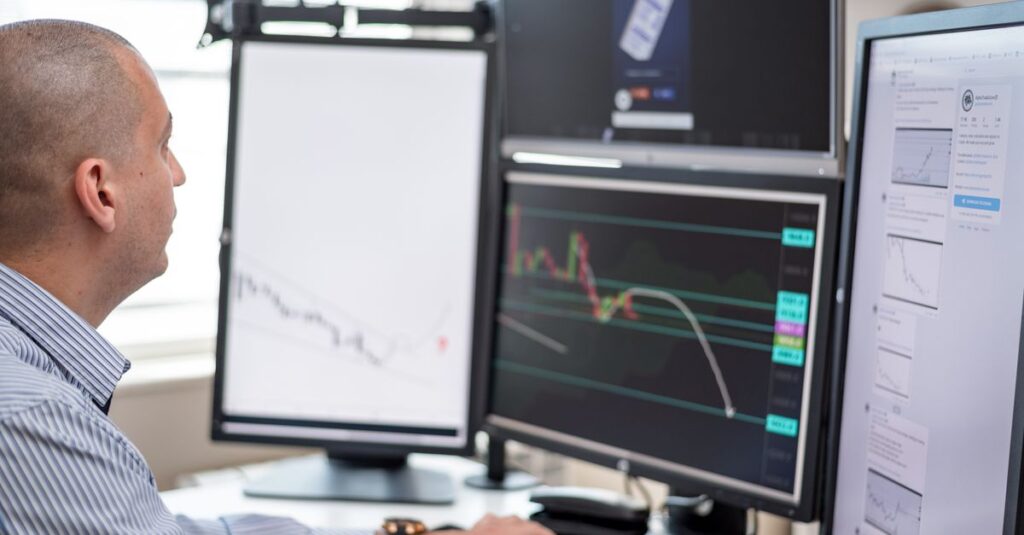 Trader comparing forex indicator categories on a MetaTrader candlestick chart for the most accurate indicator setup