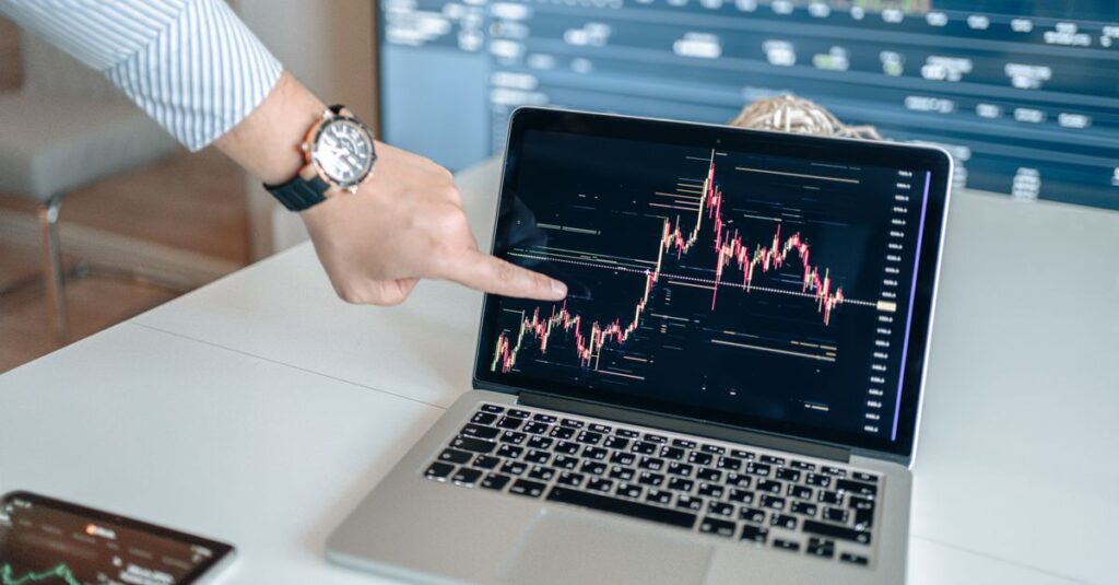 Comparing Bollinger Bands and Keltner Channels on a laptop chart